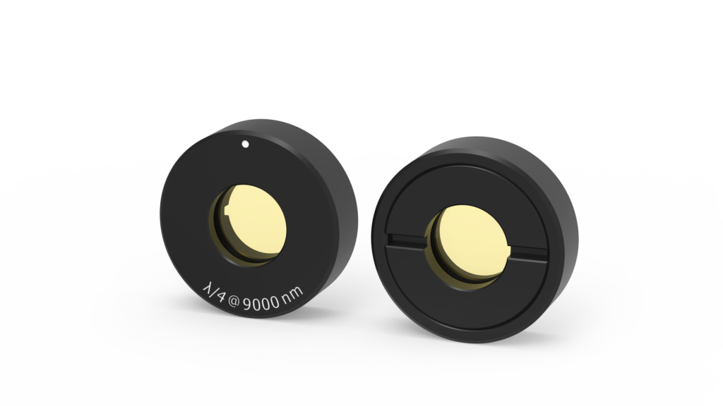 Two mid-IR waveplates with thick black casing and yellow glass